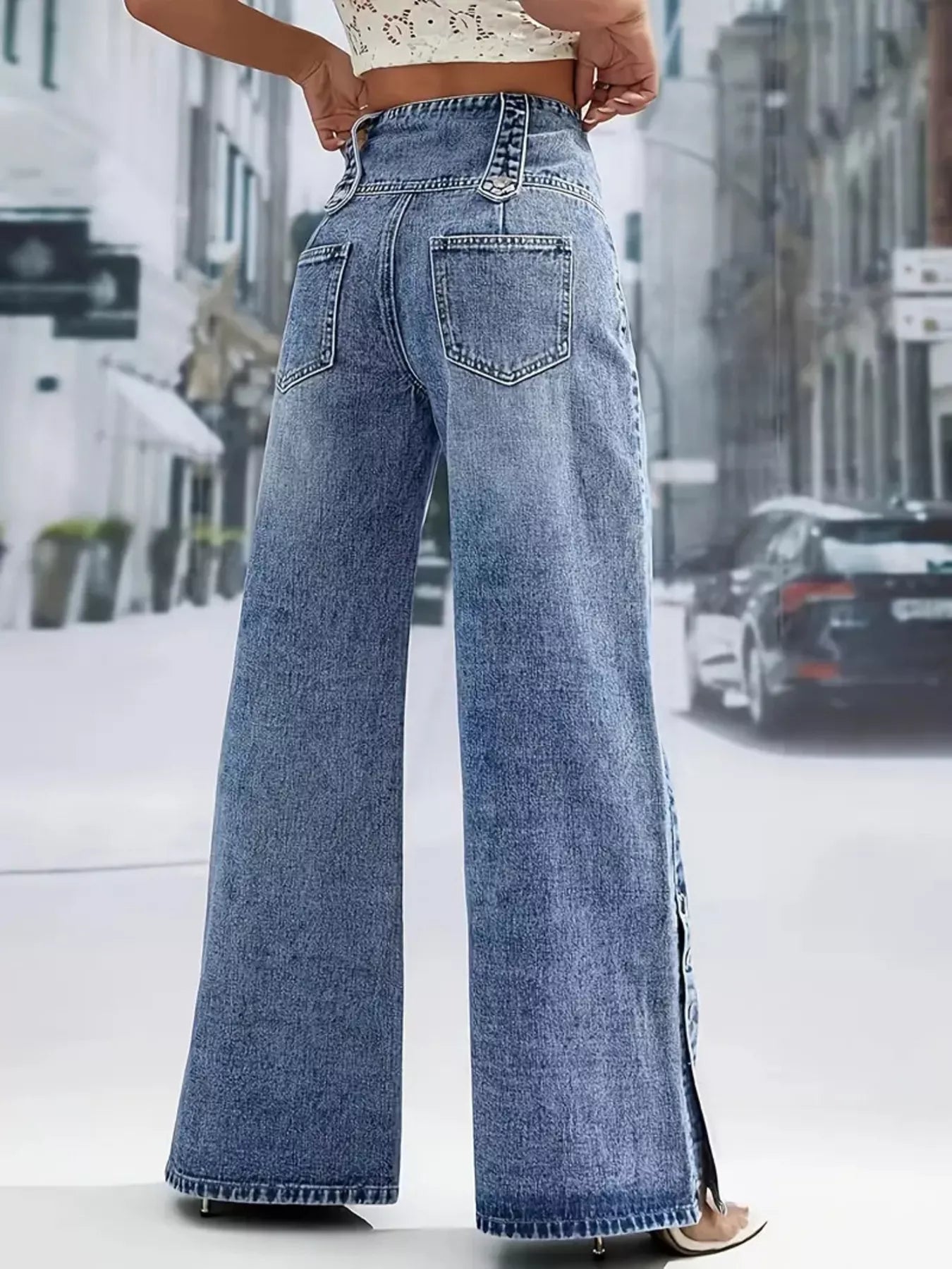 Decorative button detail on high waist blue jeans