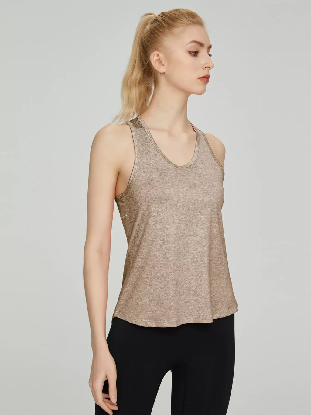 Teal quick drying tank top on model