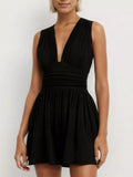 Deep V neck ruched sleeveless romper front view in black