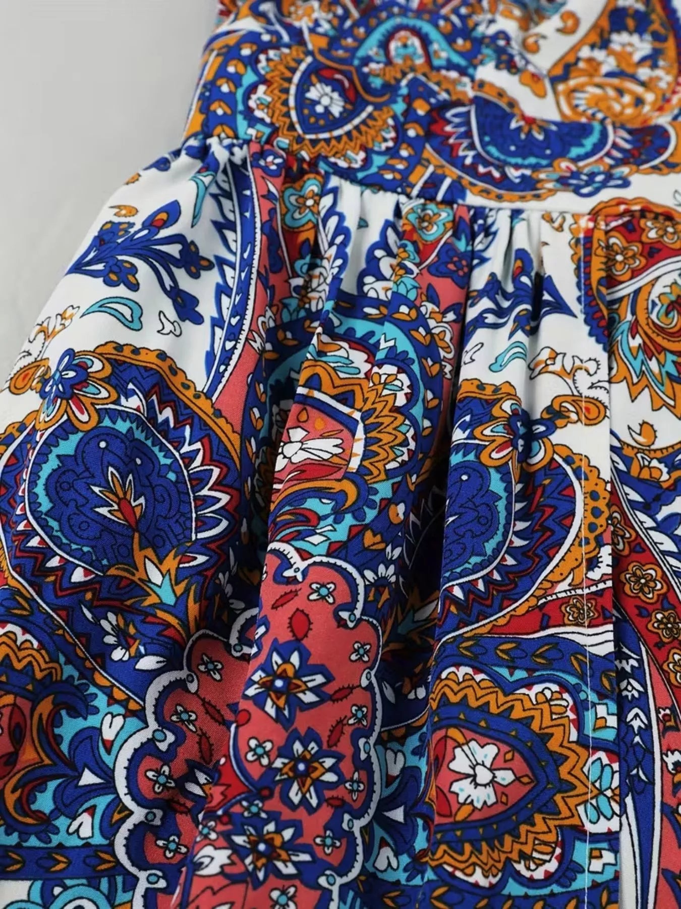 Paisley print sleeveless romper fabric drape detail