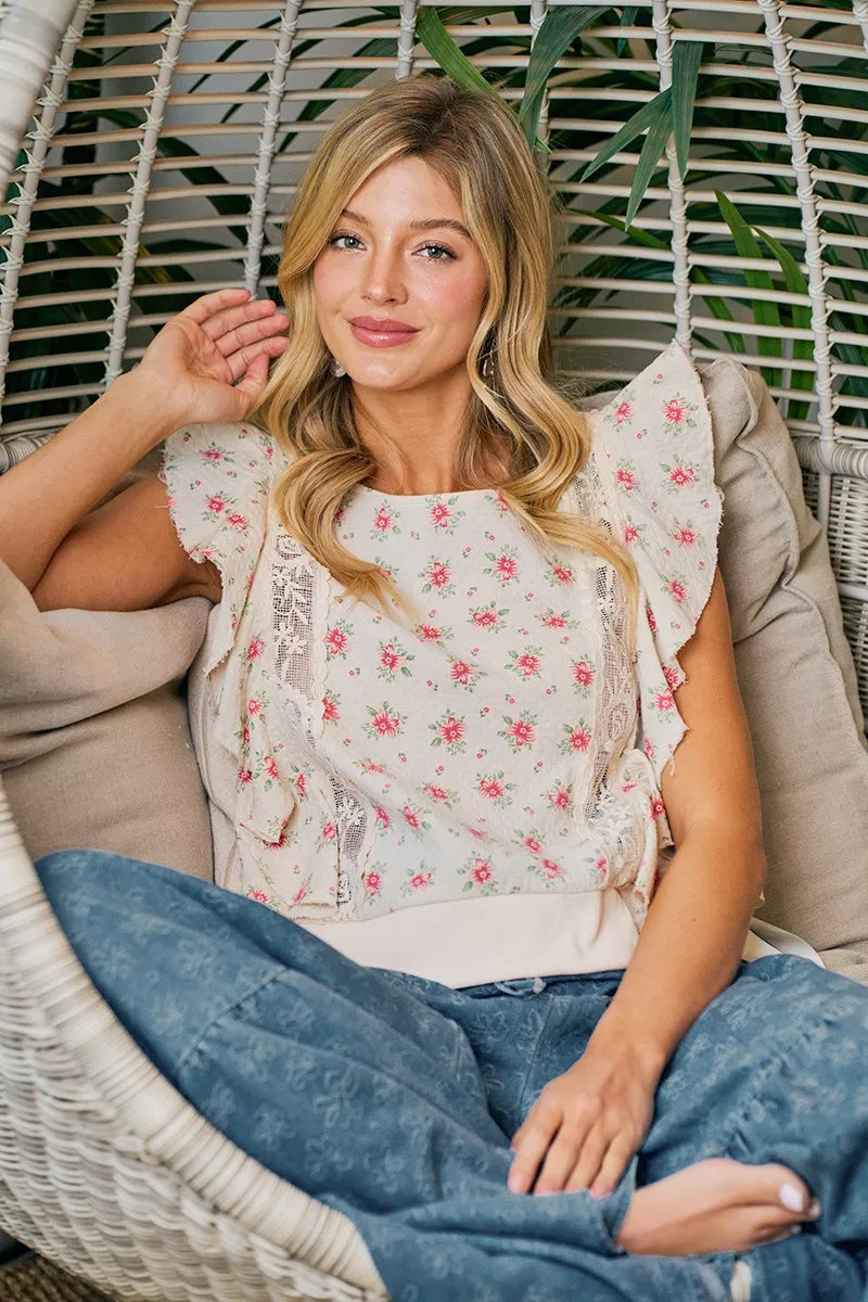 Floral print ruffle sleeve top on model