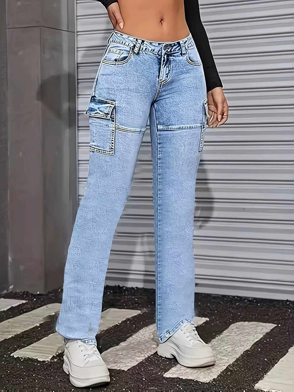 Washed blue jeans with seam detail front view