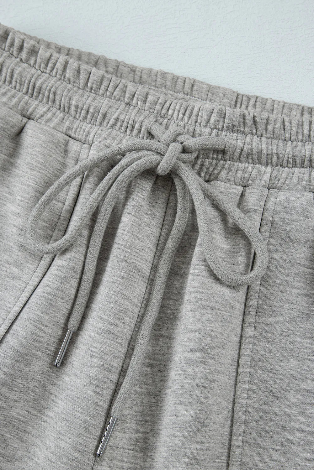 Close up of drawstring waist on active pants