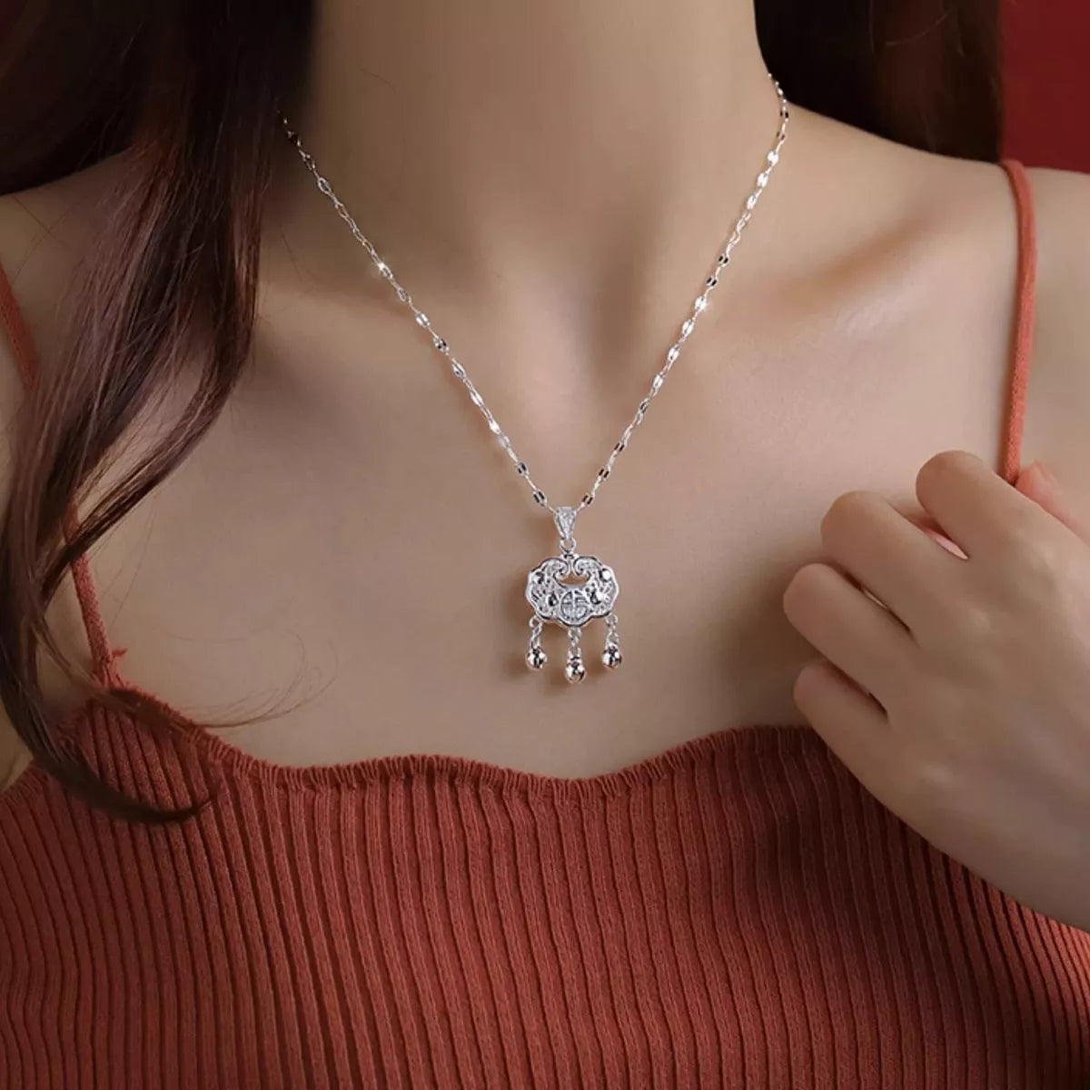 Sterling silver lock necklace on chain