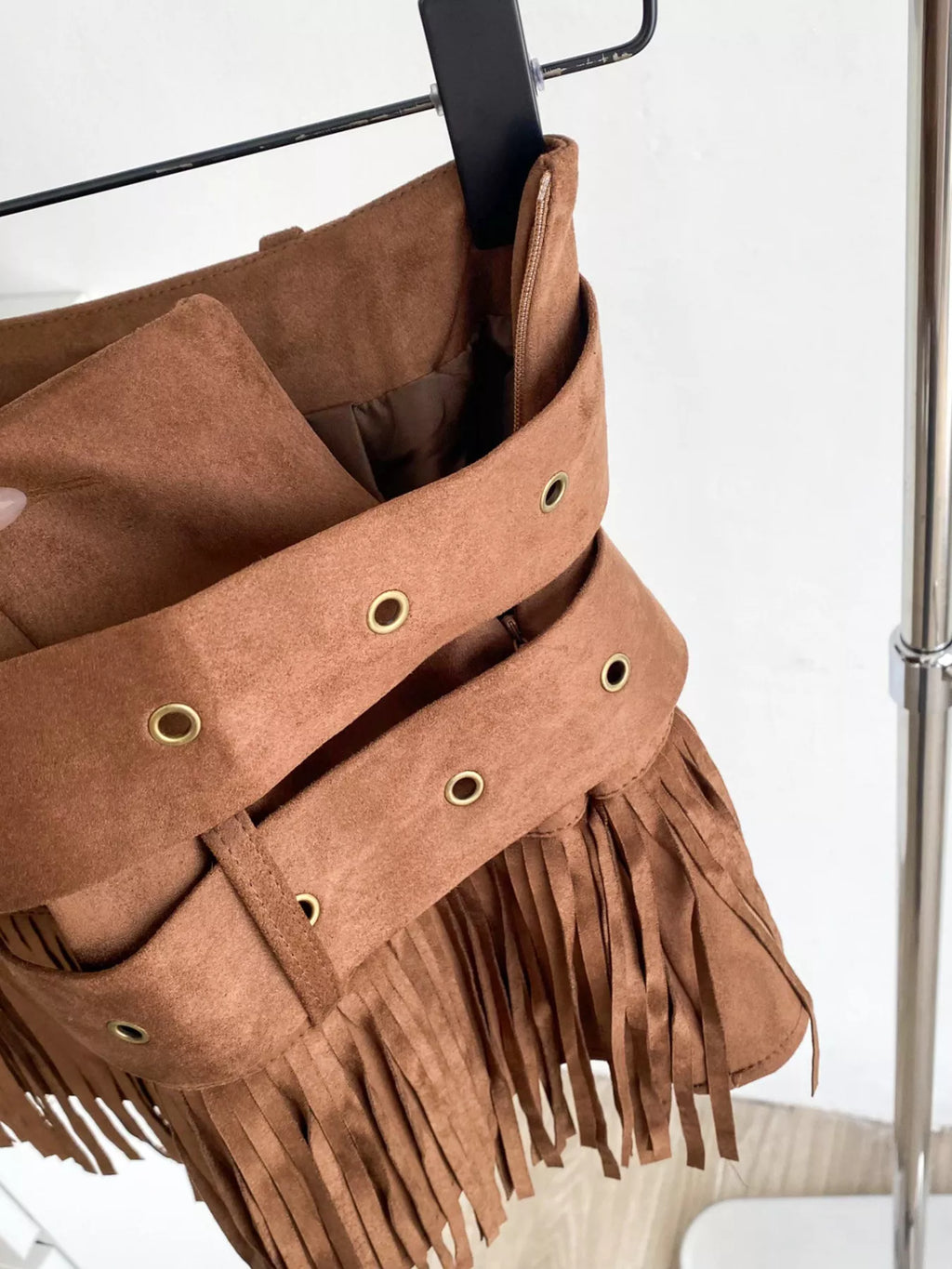 Fringe mini skirt tie belt detail