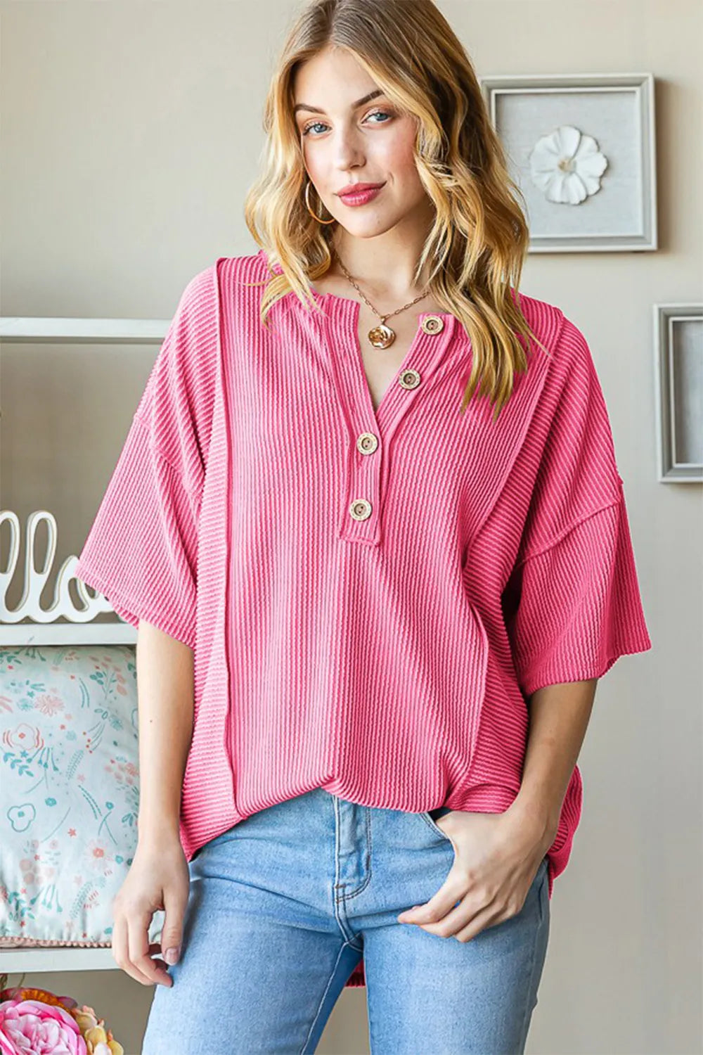 Ribbed half button drop shoulder top front view in hot pink