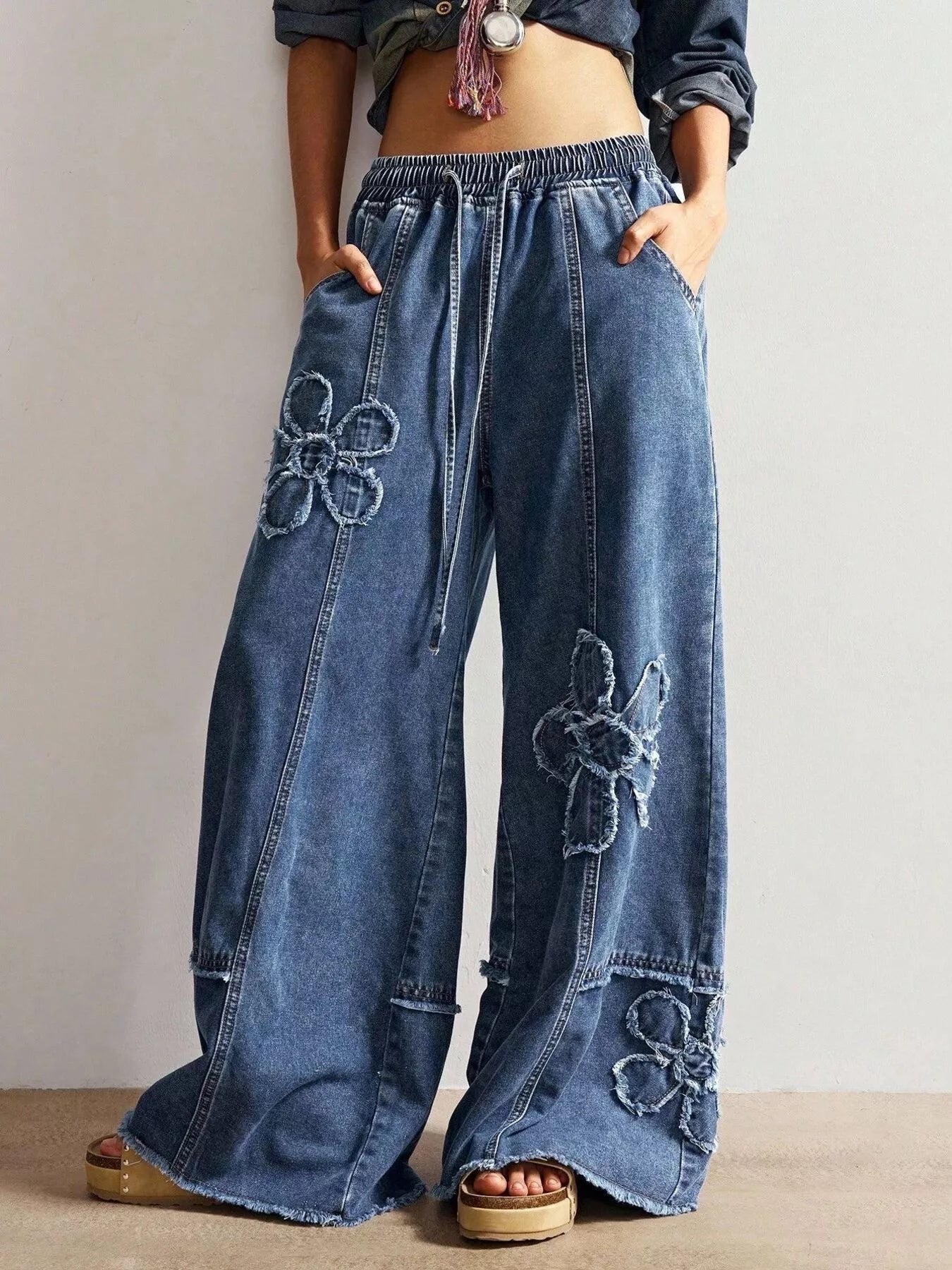 Seam detail on floral applique denim