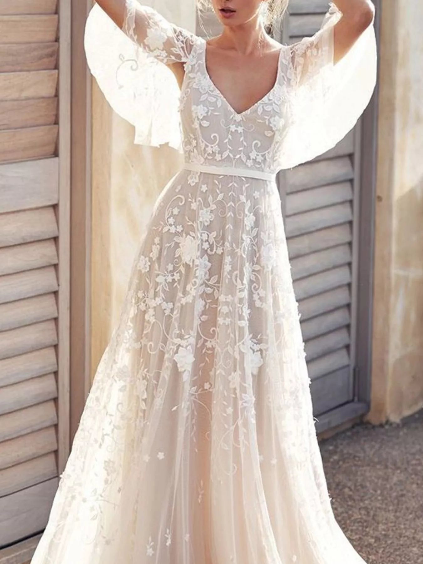 Lace pattern detail on white dress