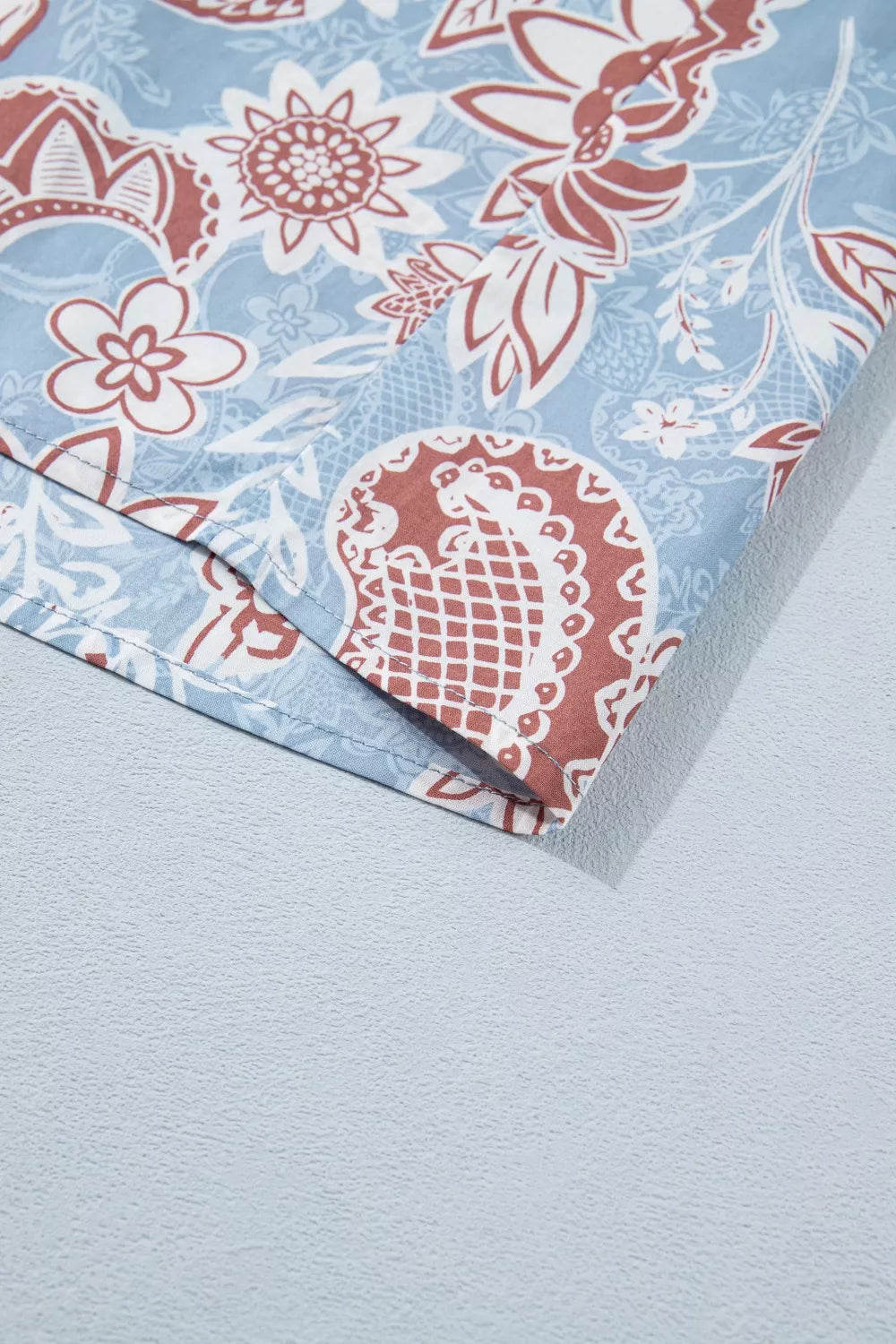 Floral button down shirt sleeve close up
