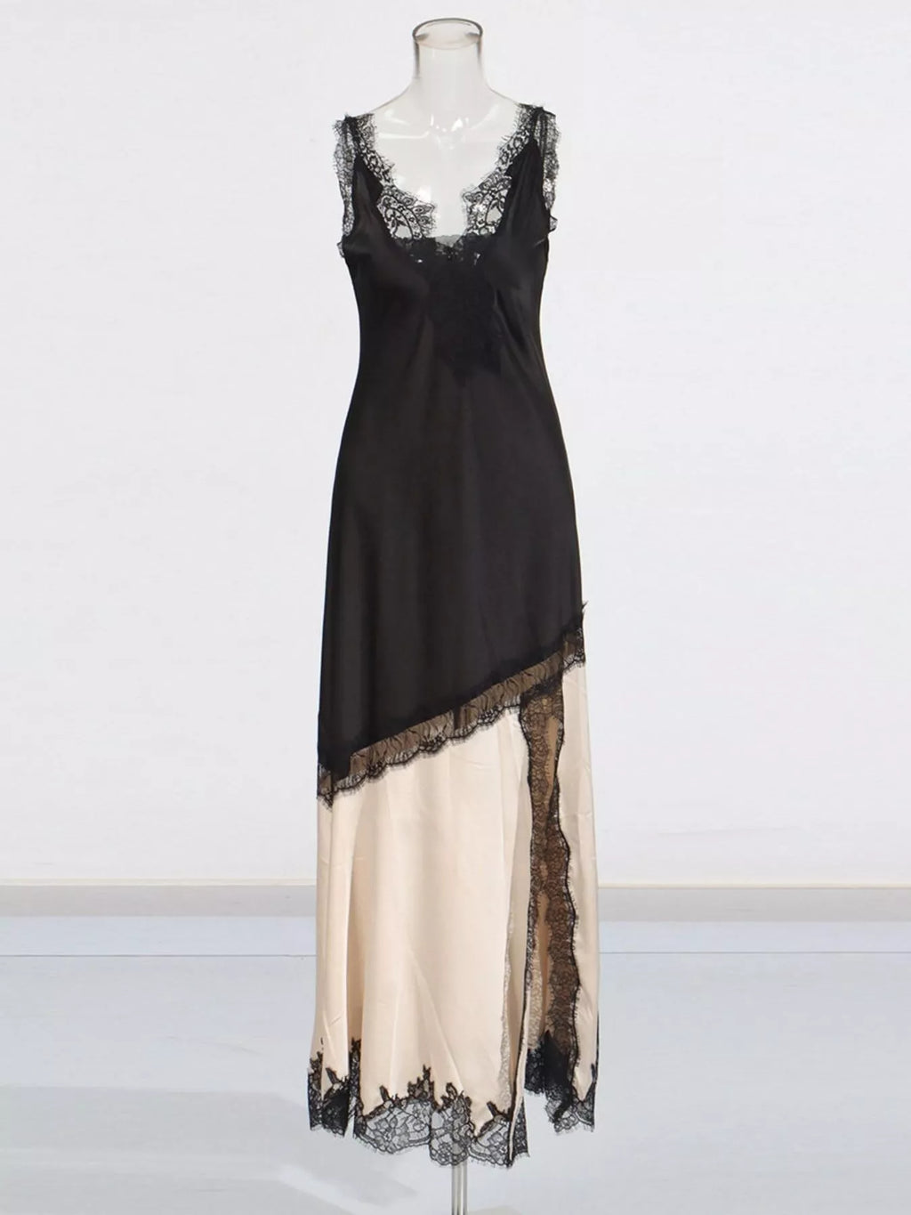 Lace detail on black slip dress