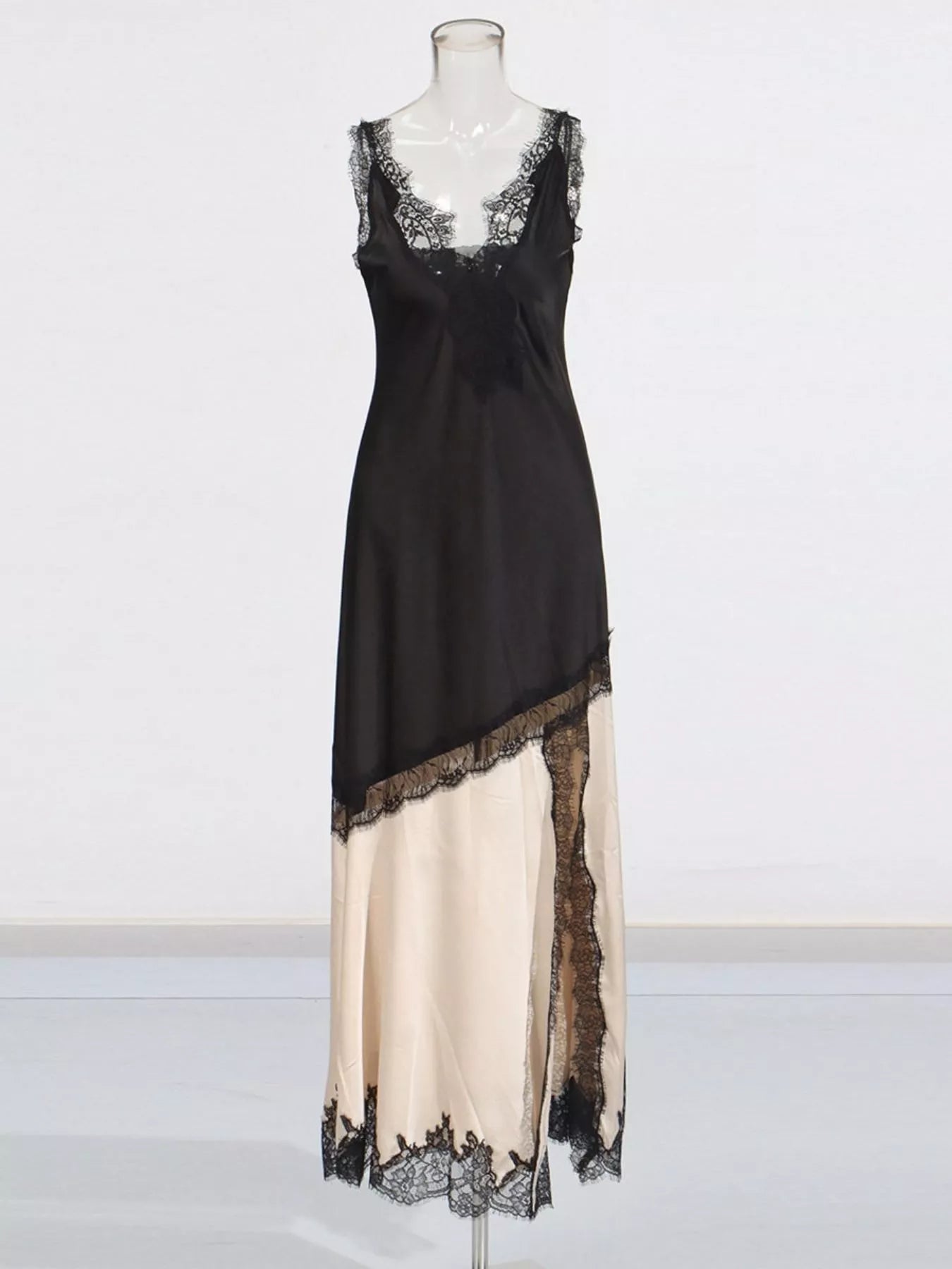 Lace detail on black slip dress