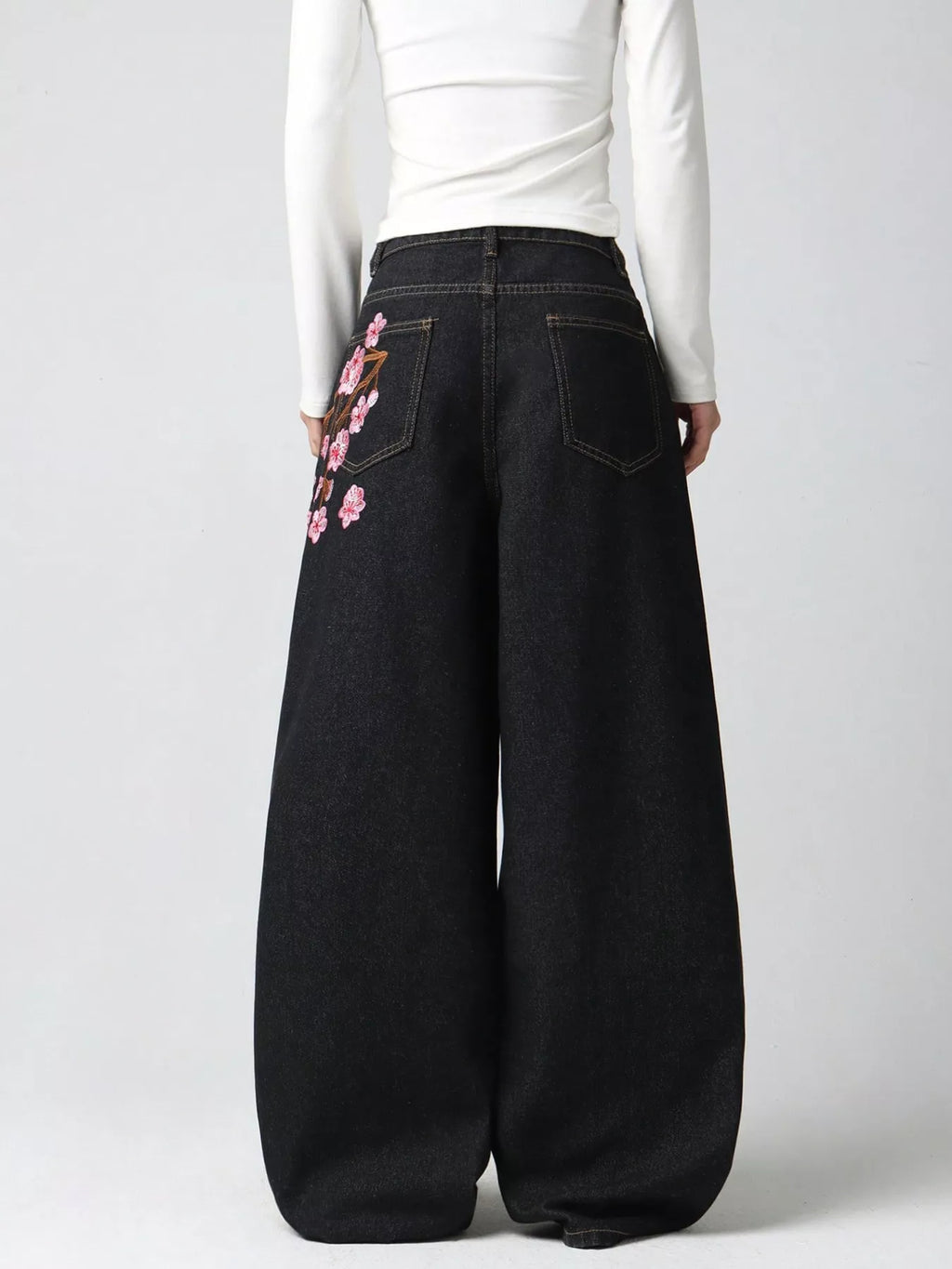 Embroidered wide leg jeans fabric detail