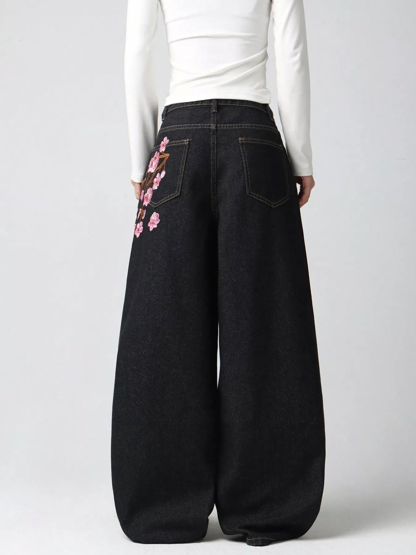 Embroidered wide leg jeans fabric detail