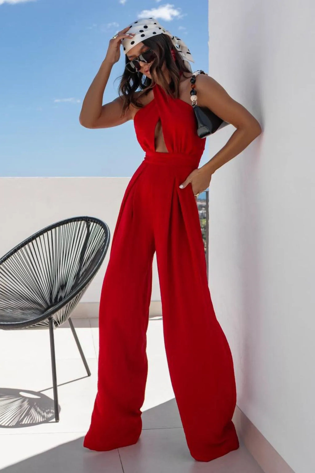 Red halter neck wide leg jumpsuit front view