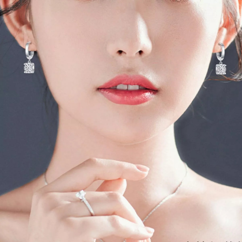 Moissanite drop earrings close up of stone sparkle