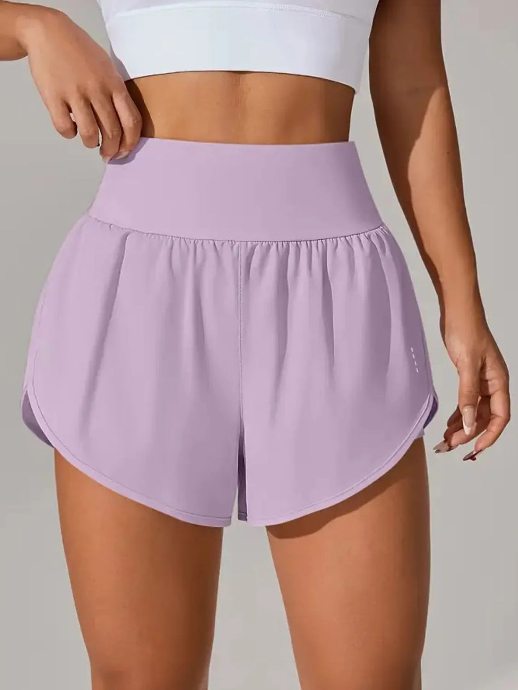 Neon green pocketed active shorts detail