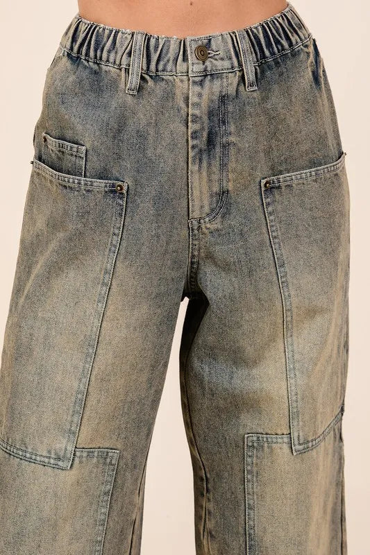 Washed denim wide leg jeans detail of wash