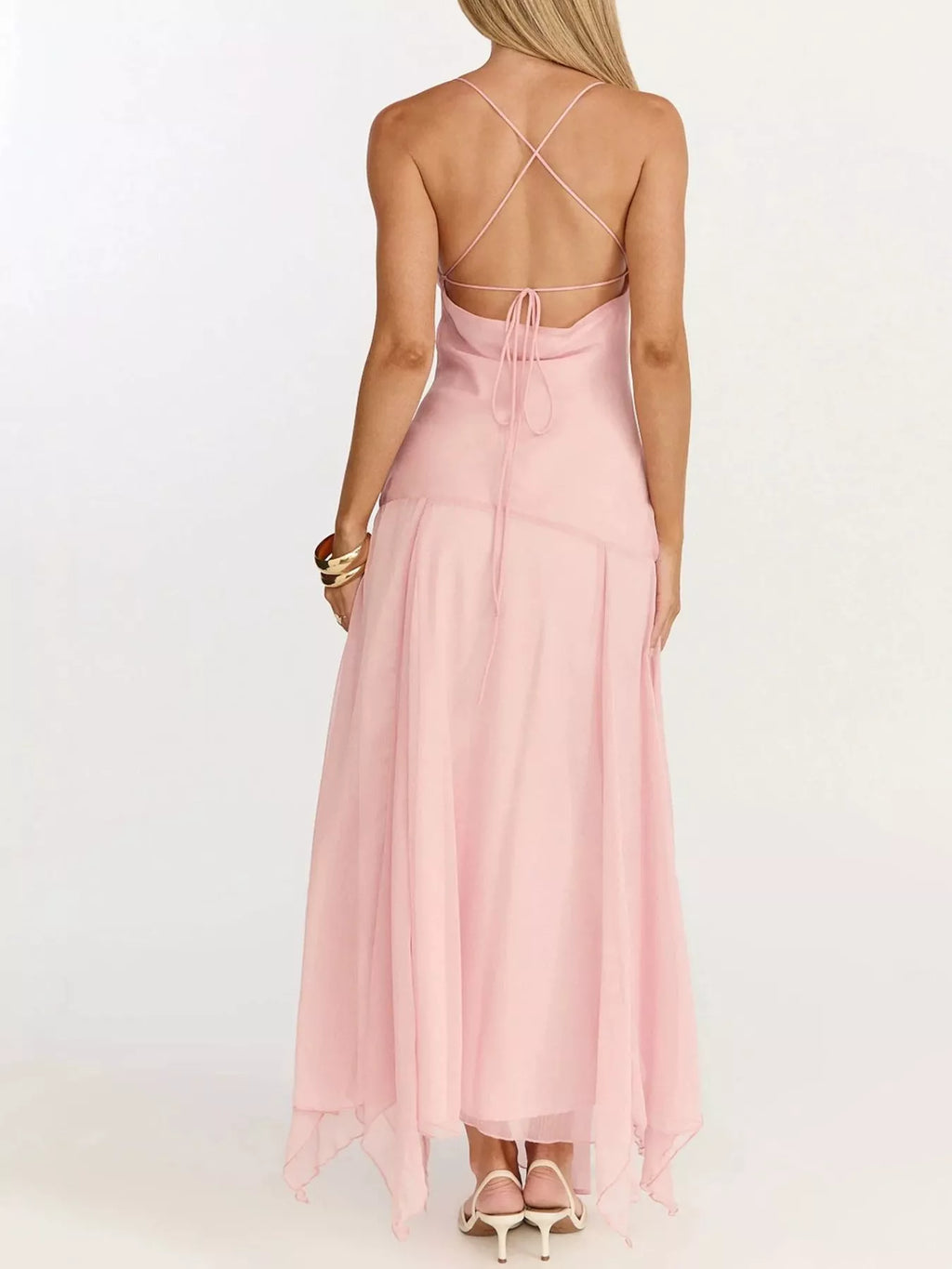 Side slit detail on pink spaghetti strap dress