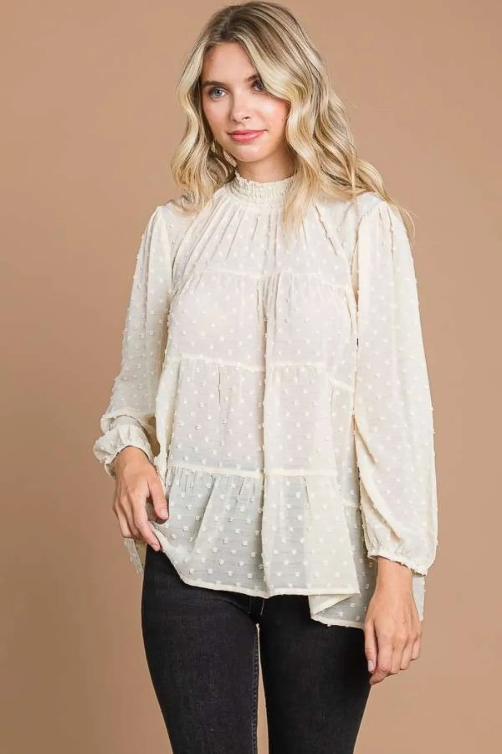 Swiss dot smocked mock neck blouse front view in ivory cream