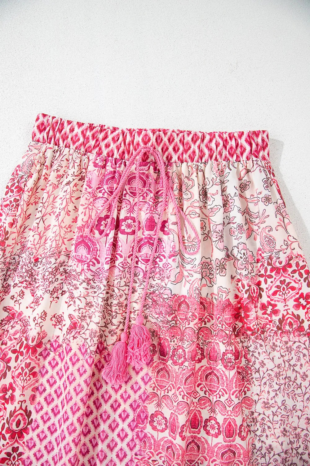 Flowy printed long skirt shown on model