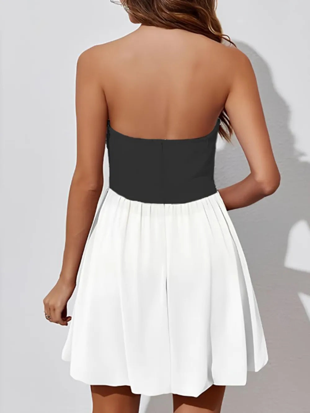 Two tone strapless bodycon mini dress side view on model