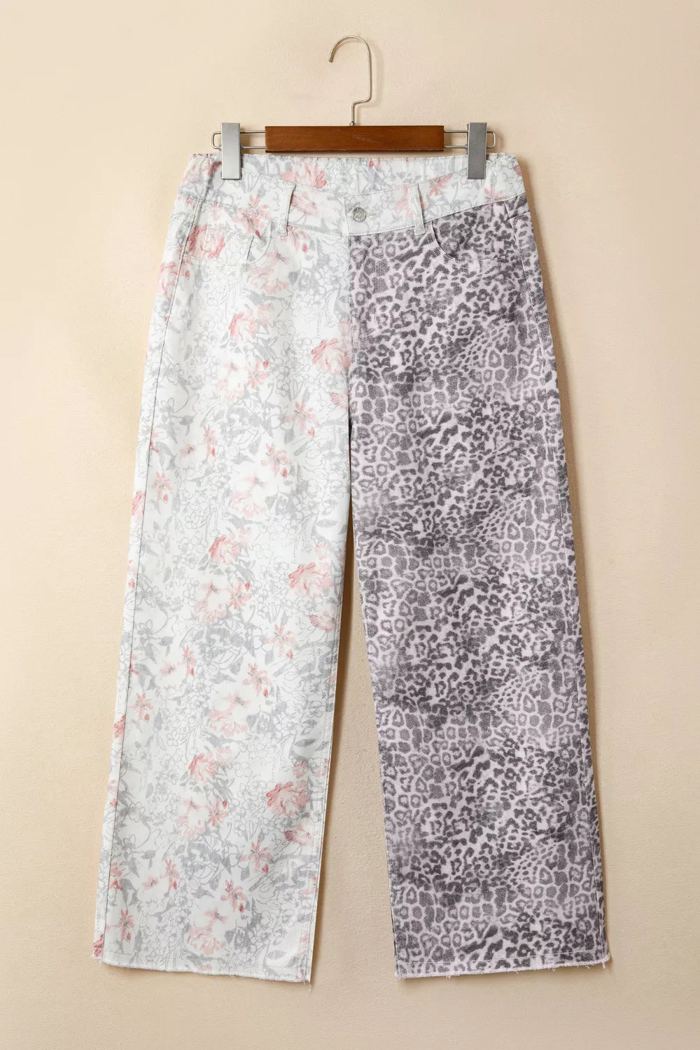 Cropped cut detail on printed jeans