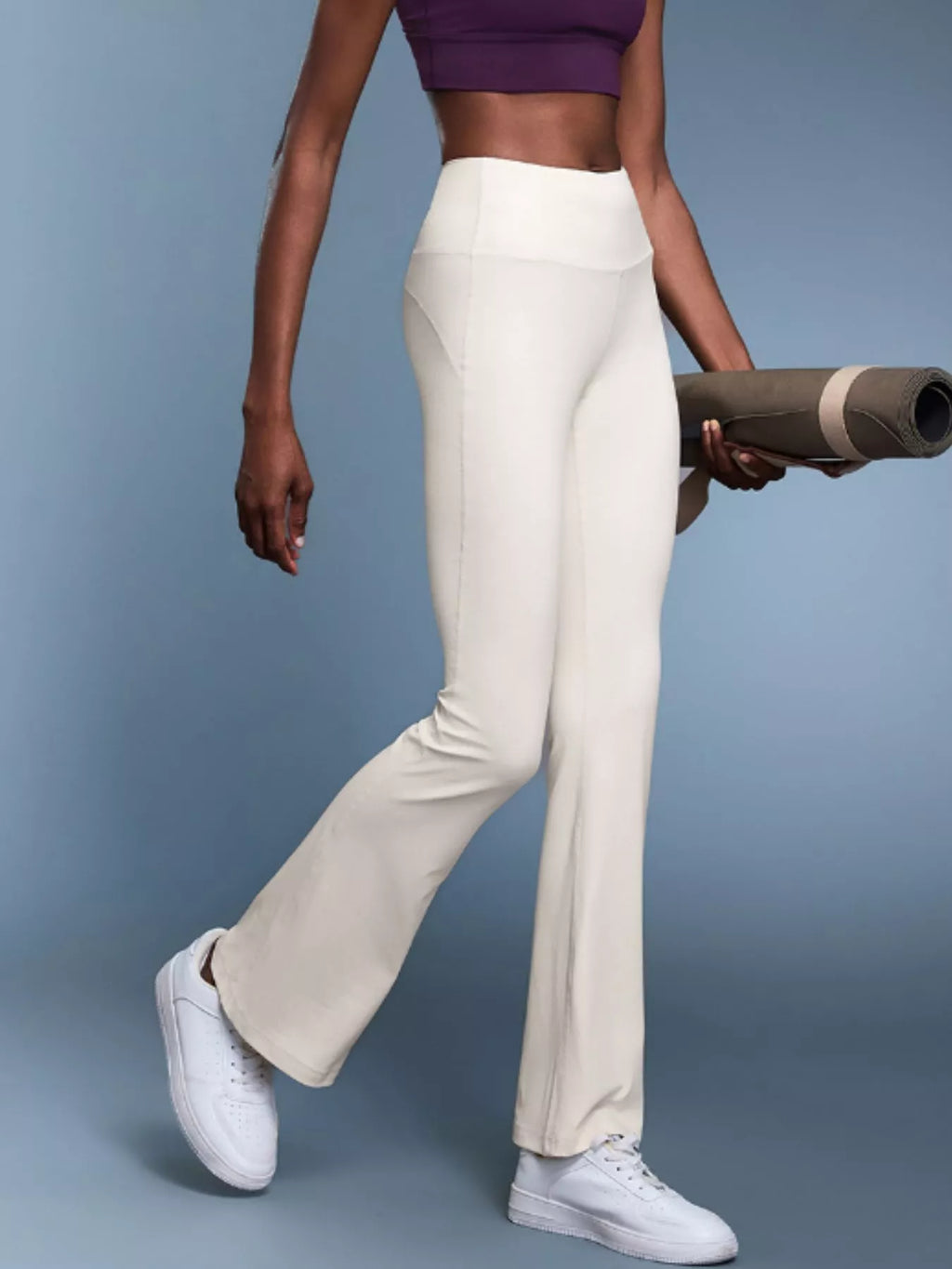 Flare bootcut pants styled with heeled boots