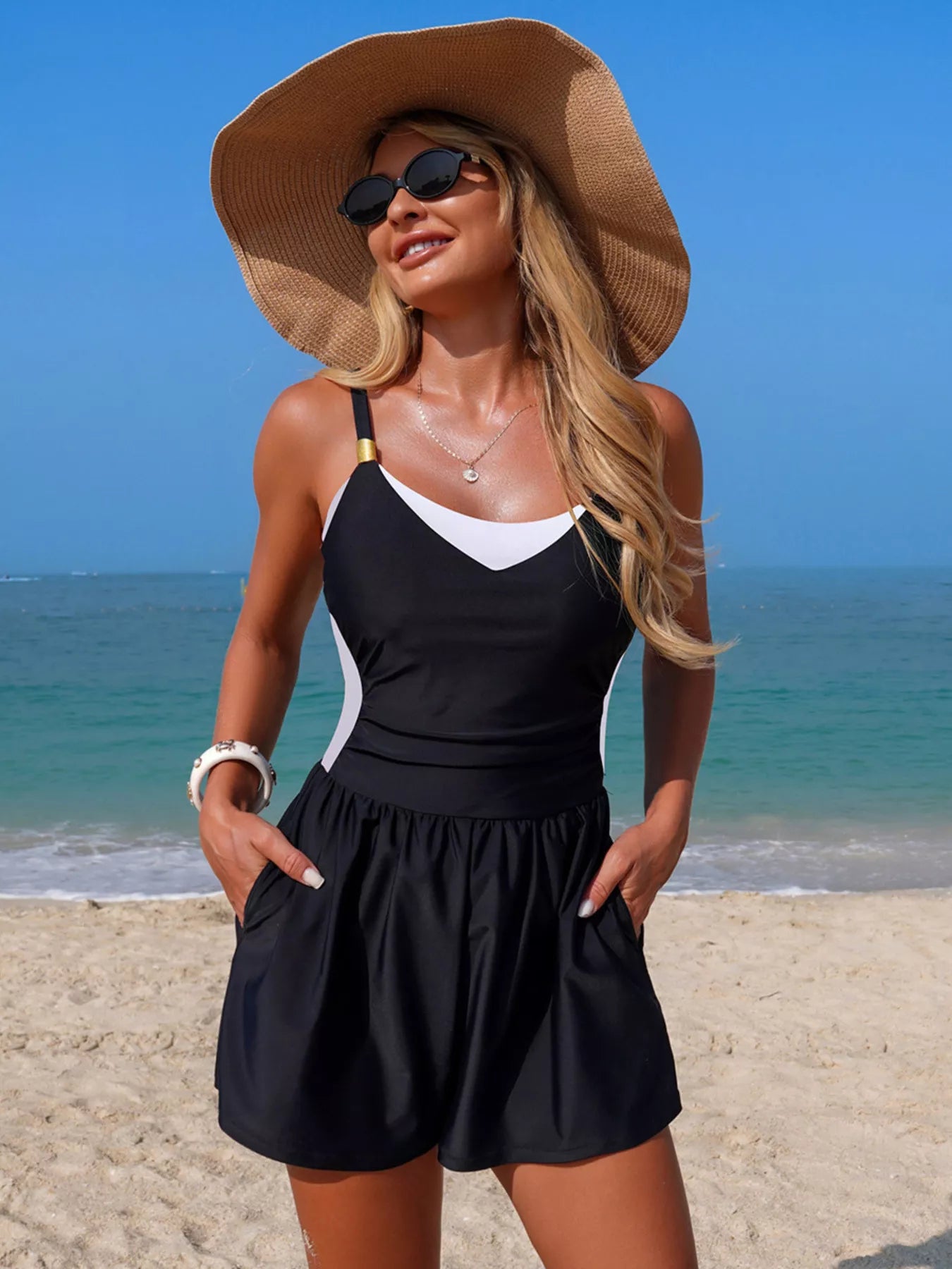 Black and white color block swimsuit model styled look