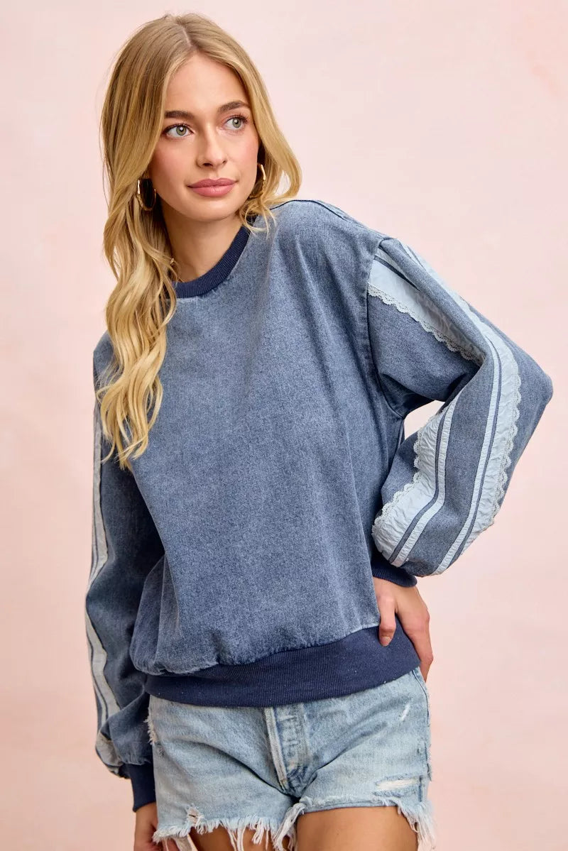 Denim sweatshirt styled with jeans