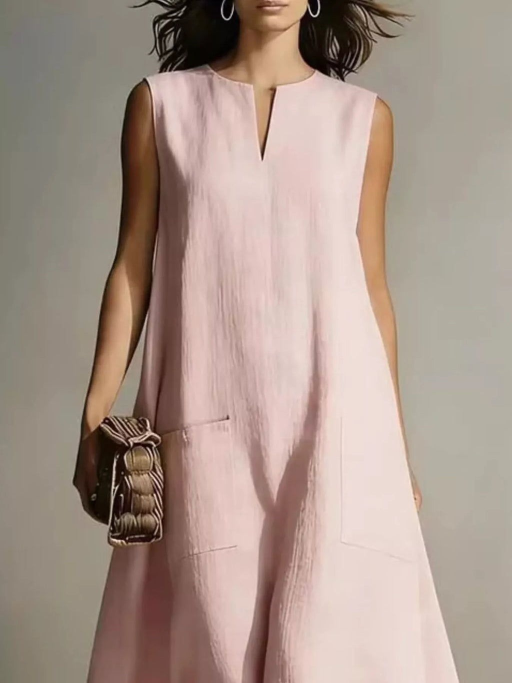 Notched neckline detail of sleeveless maxi dress