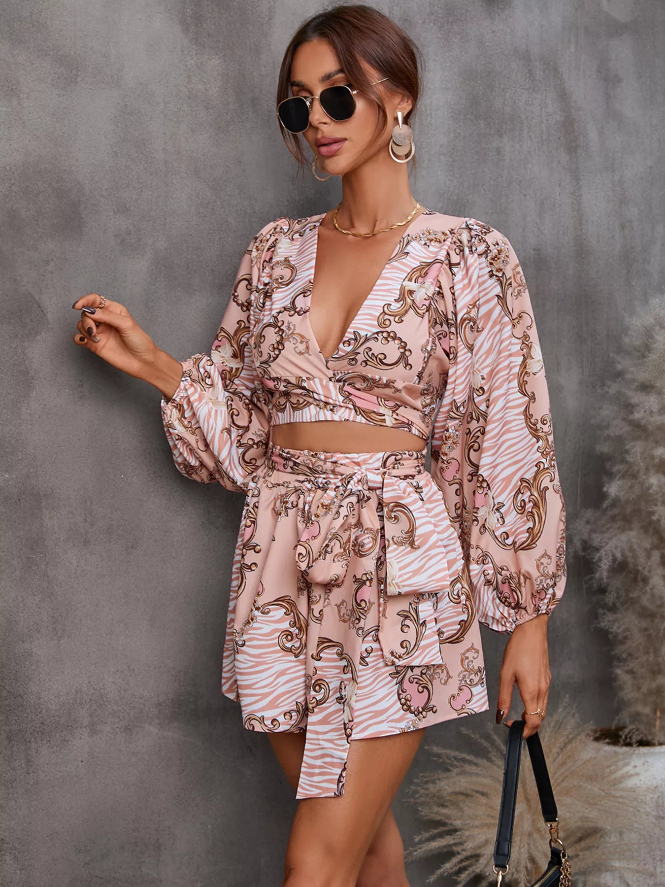 Belted printed romper in sky blue side view