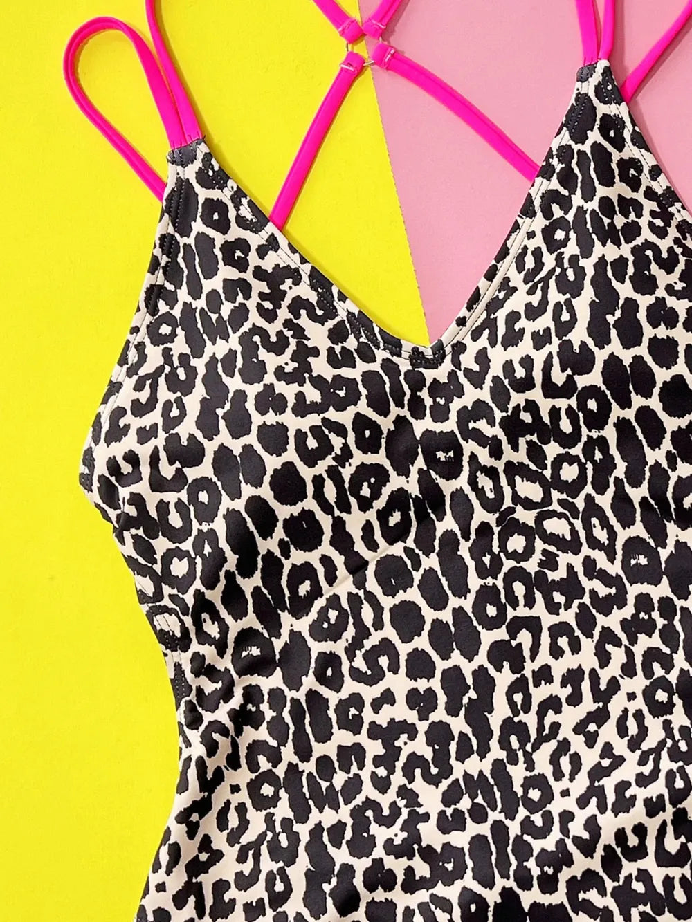 Leopard and black one piece swimsuit styled poolside