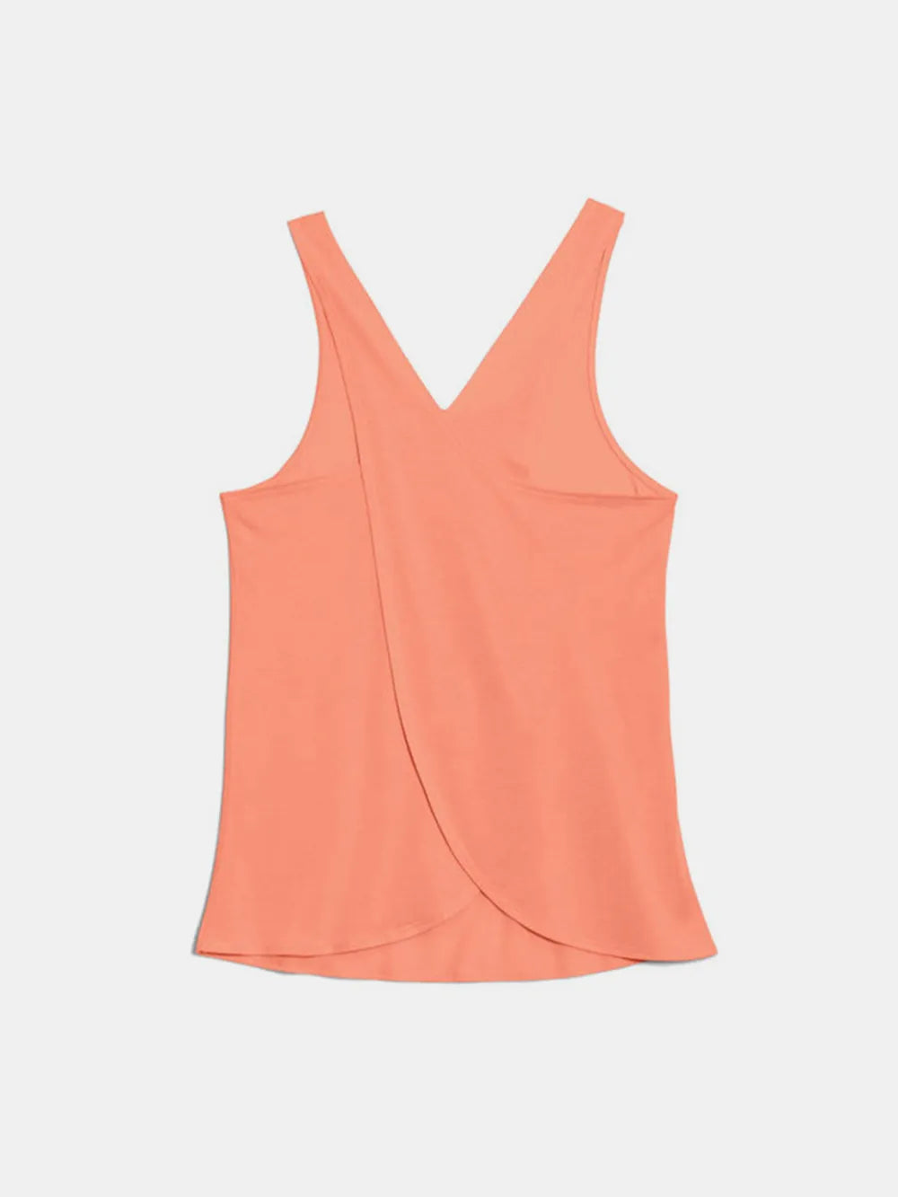 Scoop neck workout tank on model side profile