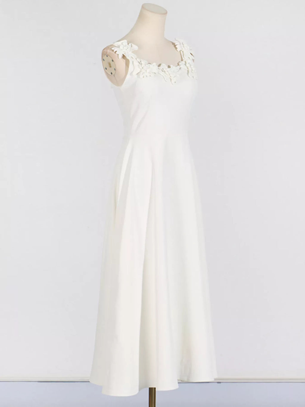 Sleeveless bodice detail on embellished dress