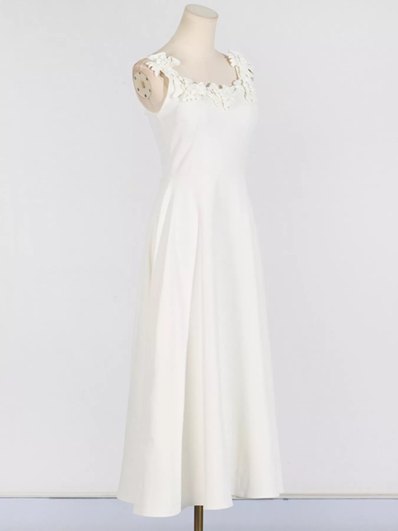 Sleeveless bodice detail on embellished dress