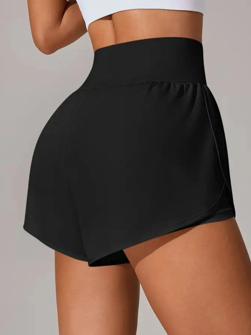 Strawberry red pocketed gym shorts side view