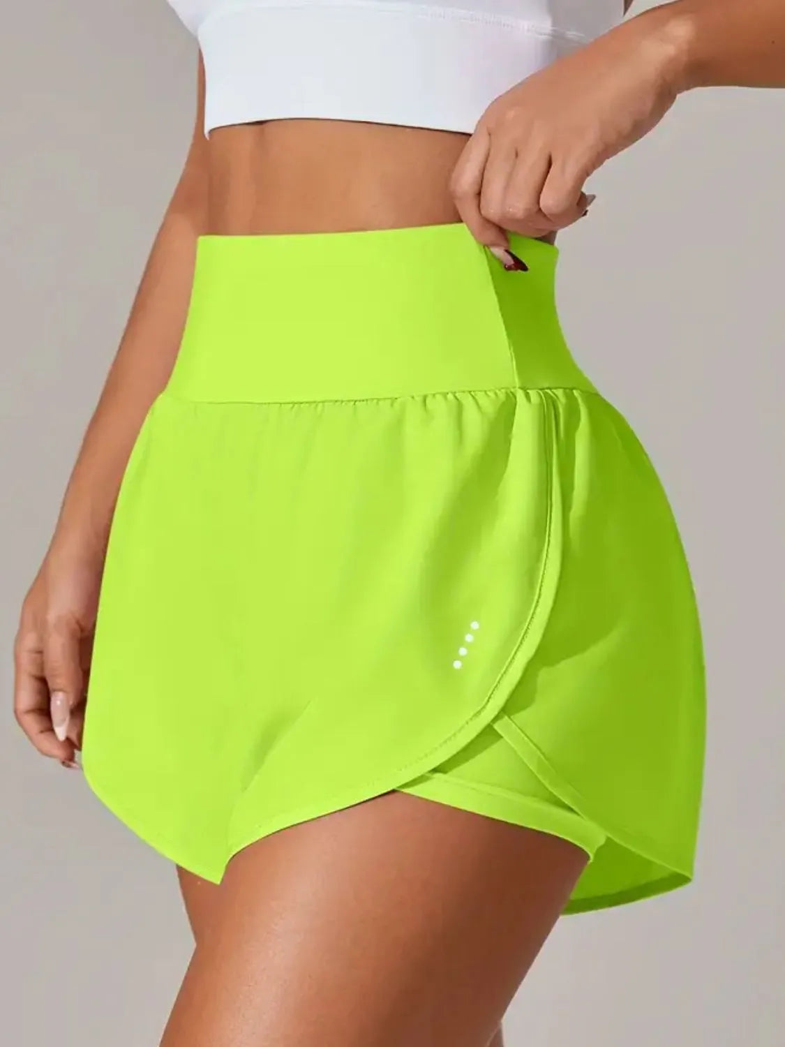 Assorted color high waist active shorts flat lay