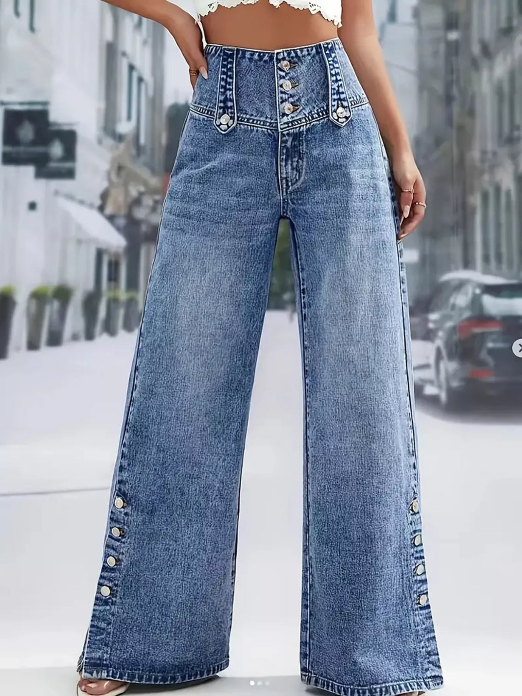Model wearing high waist button detail wide leg jeans casual look