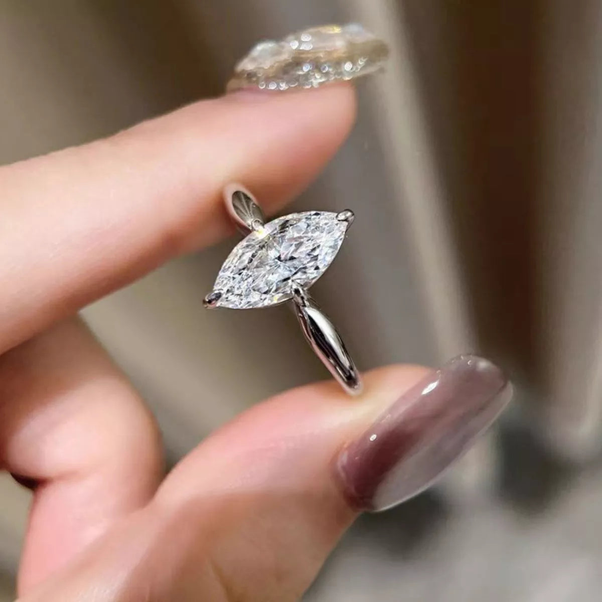 Moissanite ring displayed in matching gift box