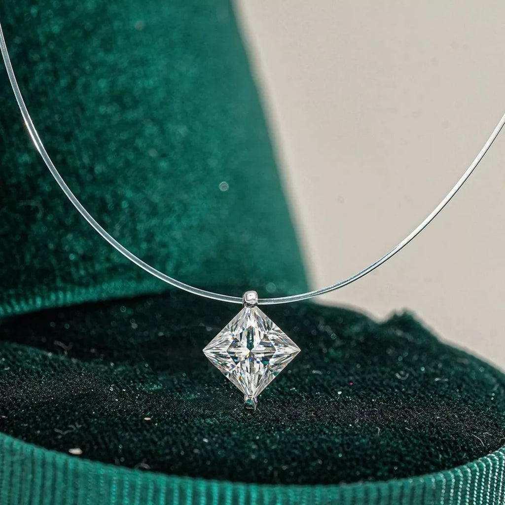 Moissanite pendant necklace worn on neckline