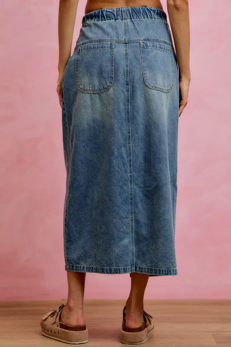 Washed denim skirt button front closure detail