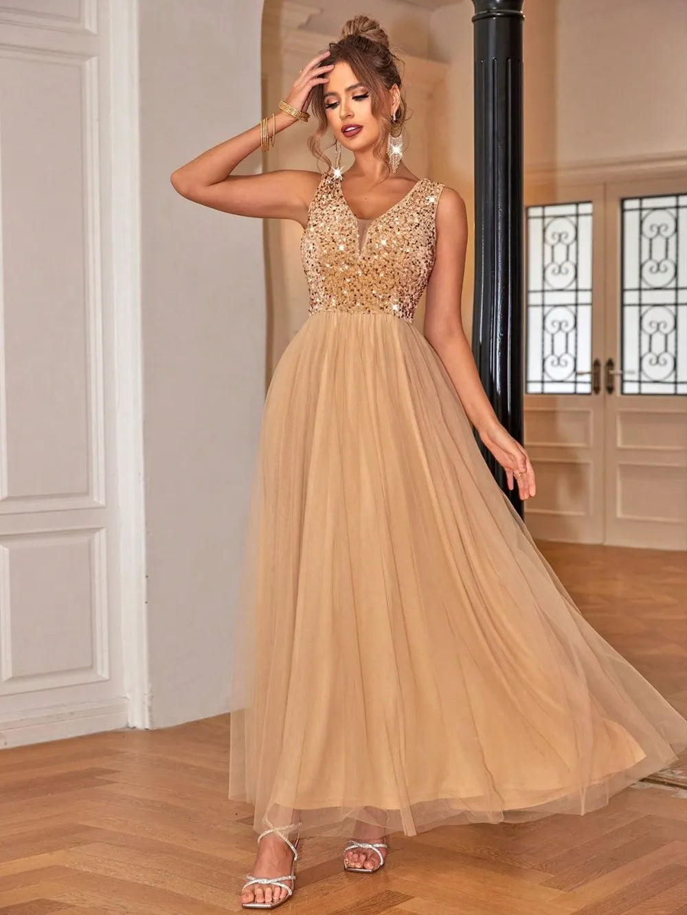 V neckline detail of tan sequin dress