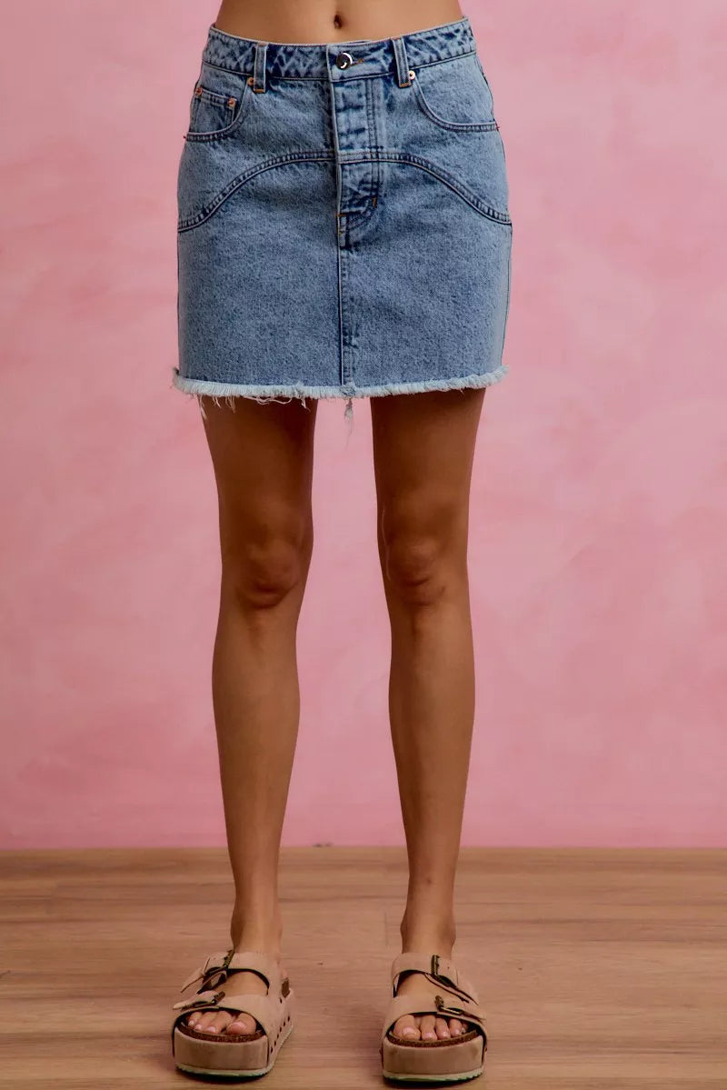 Full length view of washed denim floral mini skirt