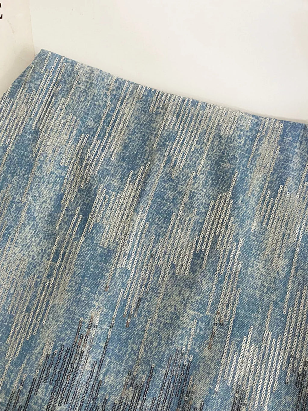 Sequin mini skirt in dark blue detail