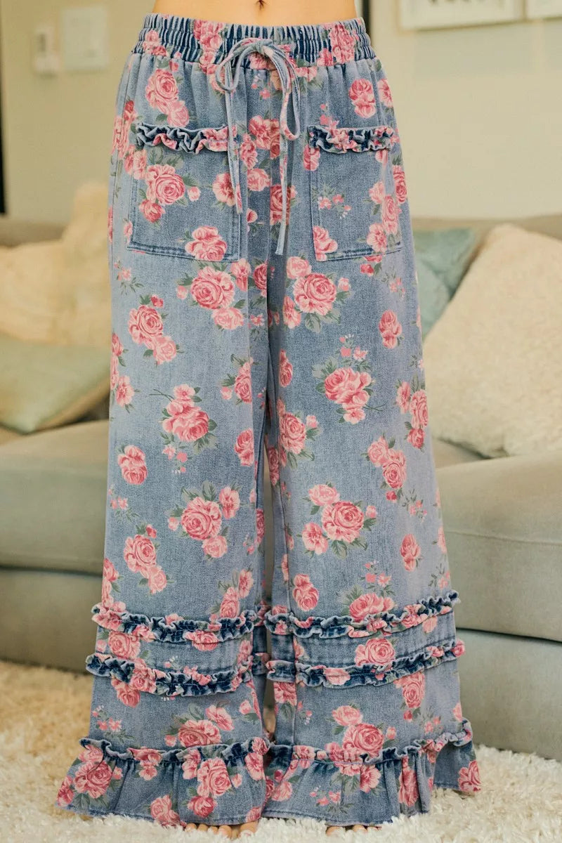 Floral print detail on washed denim fabric