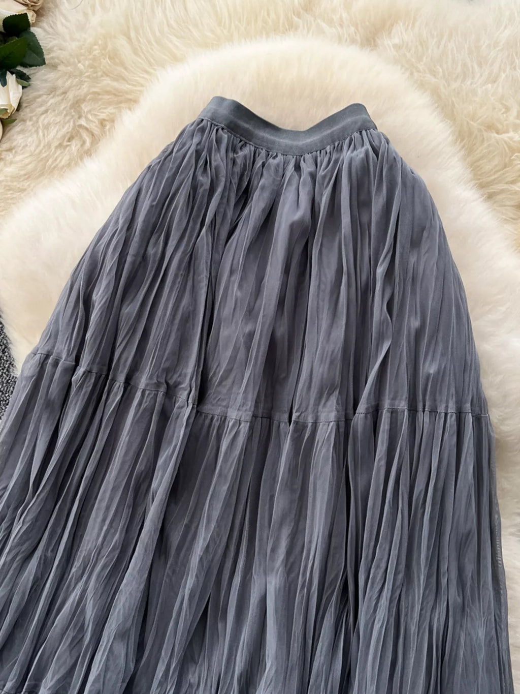 Tiered tulle skirt waist detail on model