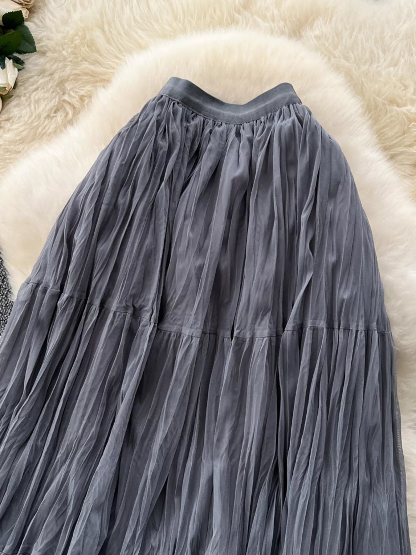 Tiered tulle skirt waist detail on model