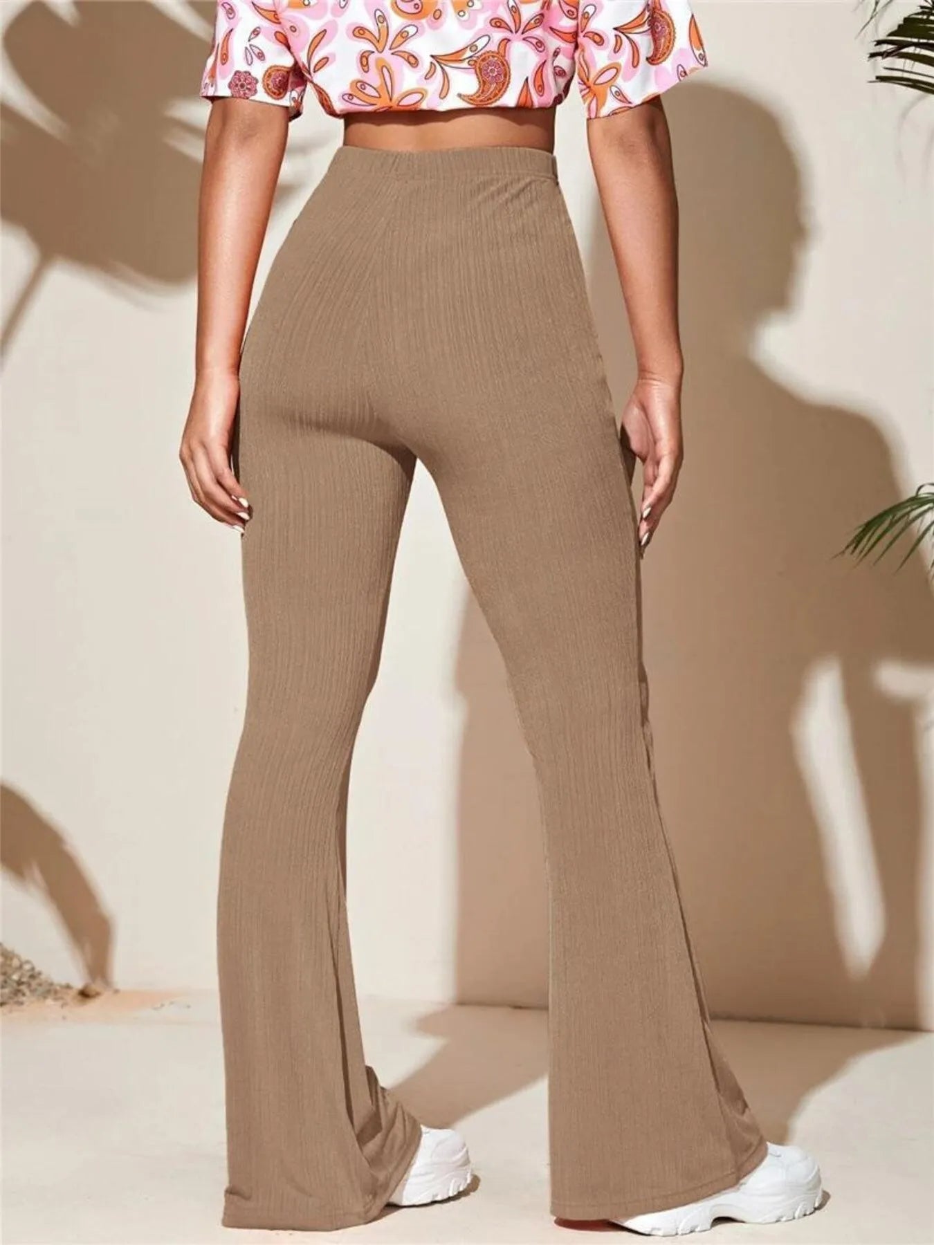 High waist flare pants back view on model