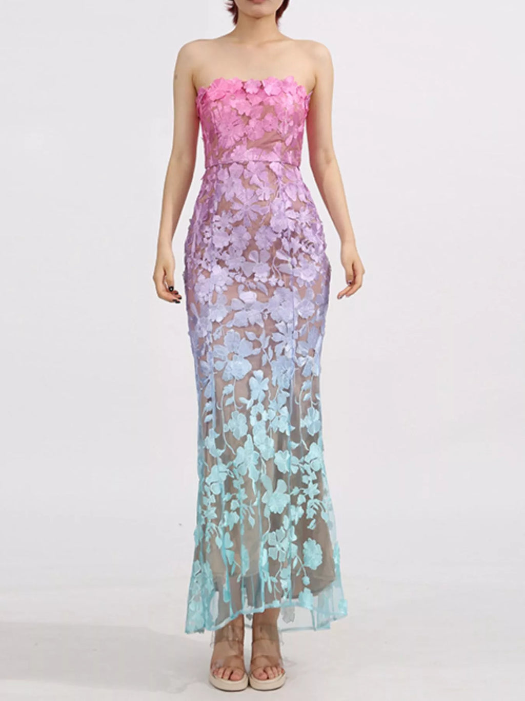 Floral embroidery detail on gradient maxi dress