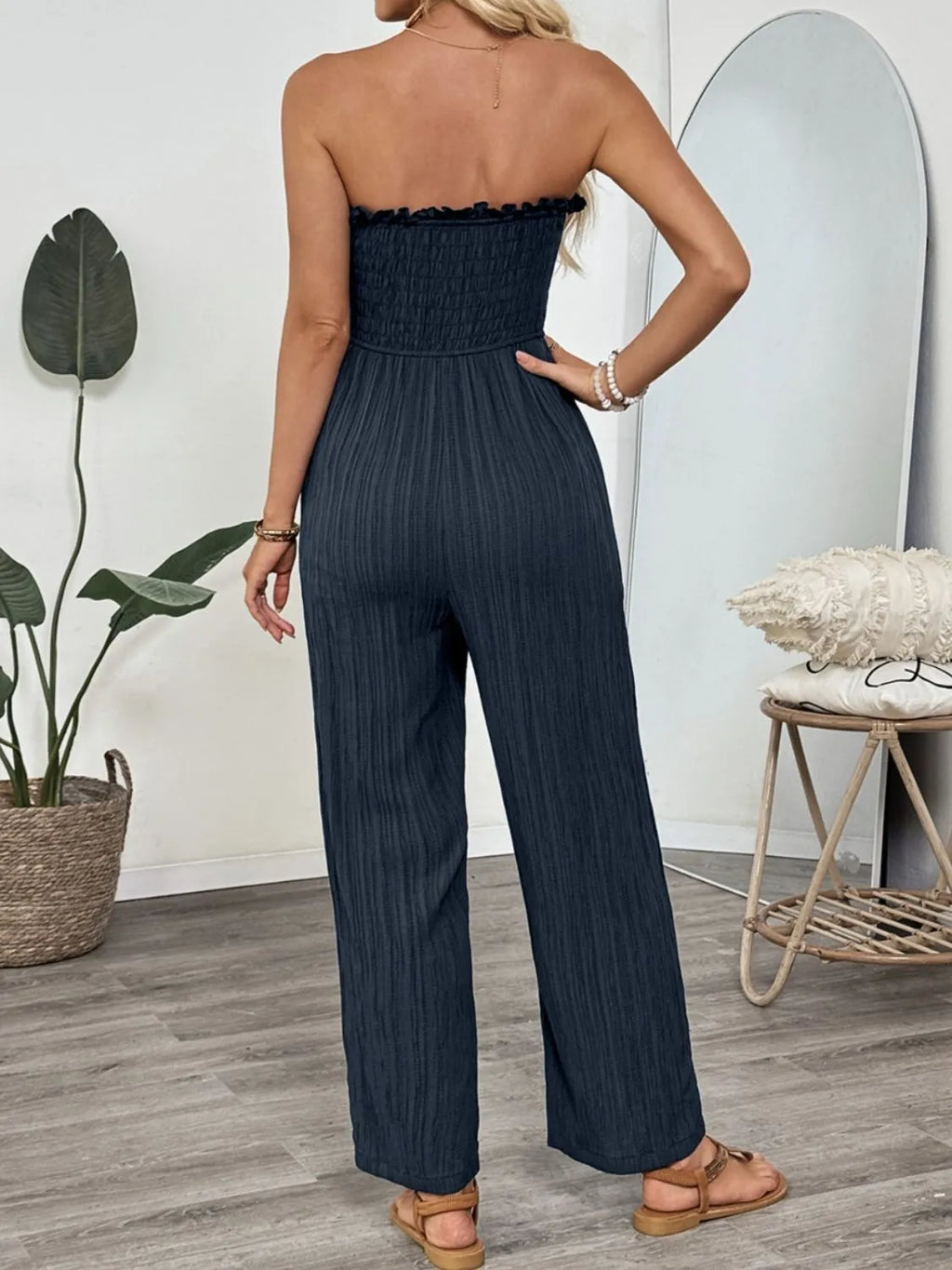 Strapless smocked jumpsuit pocket detail